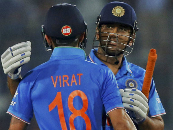 MS Dhoni (right) and Virat Kohli celebrate India's Asia Cup title win MS Dhoni (right) and Virat Kohli celebrate India's Asia Cup title win