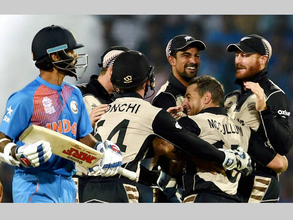 New Zealand players (right) celebrate the dismissal of Shikhar Dhawan (left) New Zealand players (right) celebrate the dismissal of Shikhar Dhawan (left)