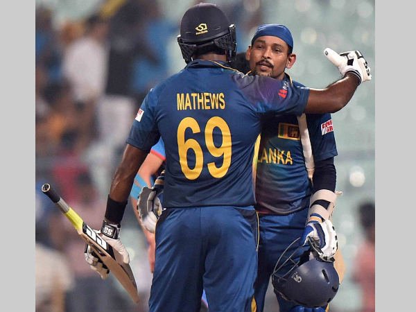 Dilshan (right) and captain Angelo Mathews embrace after winning their World T20 game against Afghanistan Dilshan (right) and captain Angelo Mathews embrace after winning their World T20 game against Afghanistan