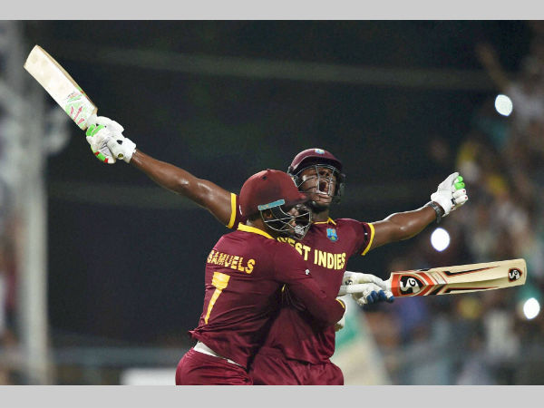 Brathwaite (right) celebrates with Samuels after the win Brathwaite (right) celebrates with Samuels after the win