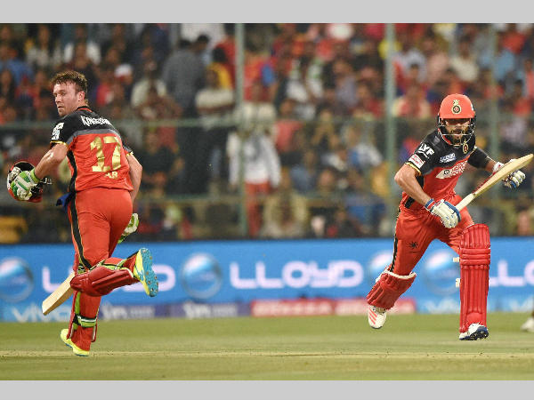De Villiers (left) and Kohli run between the wickets during IPL 2016 De Villiers (left) and Kohli run between the wickets during IPL 2016