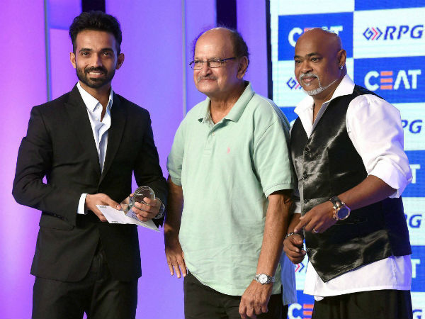 Former Indian cricketers Ajit Wadekar and Vinod Kambli present the CEAT Cricket Rating special award to Indian cricketer Ajinkya Rahane in Mumbai on Monday. Former Indian cricketers Ajit Wadekar and Vinod Kambli present the CEAT Cricket Rating special award to Indian cricketer Ajinkya Rahane in Mumbai on Monday.