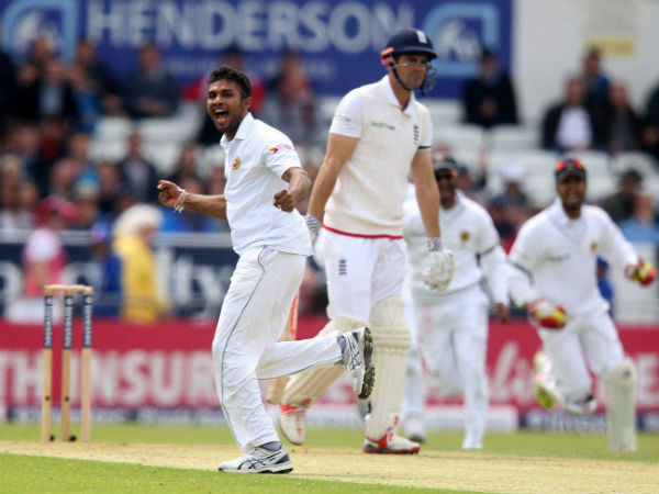 Sri Lanka's Dasun Shanaka celebrates taking the wicket of England's Alastair Cook, centre, during day one of the first cricket Test against England at Headingley Sri Lanka's Dasun Shanaka celebrates taking the wicket of England's Alastair Cook, centre, during day one of the first cricket Test against England at Headingley