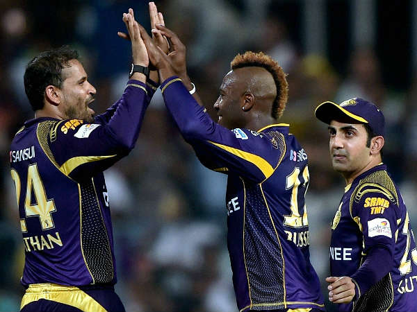 Andre Russell (centre) celebrates with Yusuf Pathan (left) after dismissing Kings XI Punjab's Marcus Stoinis as Gautam Gambhir looks on Andre Russell (centre) celebrates with Yusuf Pathan (left) after dismissing Kings XI Punjab's Marcus Stoinis as Gautam Gambhir looks on