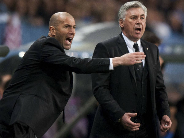 Real Madrid's assistant coach Zinedine Zidane from France, left, and coach Carlo Ancelotti from Italy. Real Madrid's assistant coach Zinedine Zidane from France, left, and coach Carlo Ancelotti from Italy.
