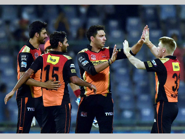 Warner (right) and his team-mates celebrate SRH's win over KKR Warner (right) and his team-mates celebrate SRH's win over KKR