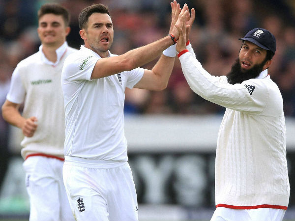 England's James Anderson, centre, celebrates with Moeen Ali after taking the wicket of Sri Lanka's Kaushal Silva during the first Test at Headingley, Leeds, England, on May 21 England's James Anderson, centre, celebrates with Moeen Ali after taking the wicket of Sri Lanka's Kaushal Silva during the first Test at Headingley, Leeds, England, on May 21