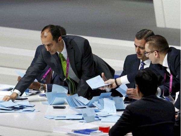 Secretary General Markus Kattner, second from right, and other FIFA officials count the votes during the extraordinary FIFA congress in Zurich, Switzerland Secretary General Markus Kattner, second from right, and other FIFA officials count the votes during the extraordinary FIFA congress in Zurich, Switzerland