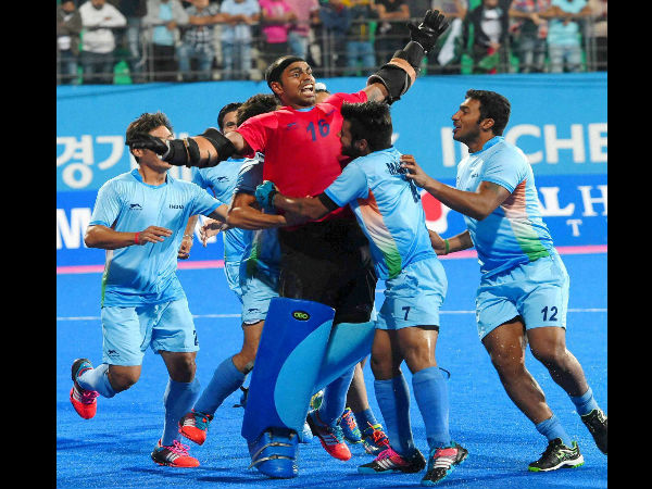 Indian hockey goalkeeper Sreejesh celebrate with team mates Indian hockey goalkeeper Sreejesh celebrate with team mates