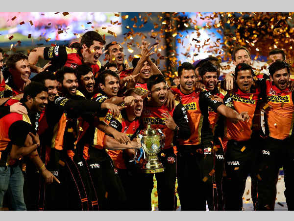 SRH players celebrate with the IPL trophy SRH players celebrate with the IPL trophy
