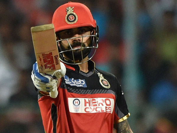 Virat Kohli celebrates his half century in the final Virat Kohli celebrates his half century in the final