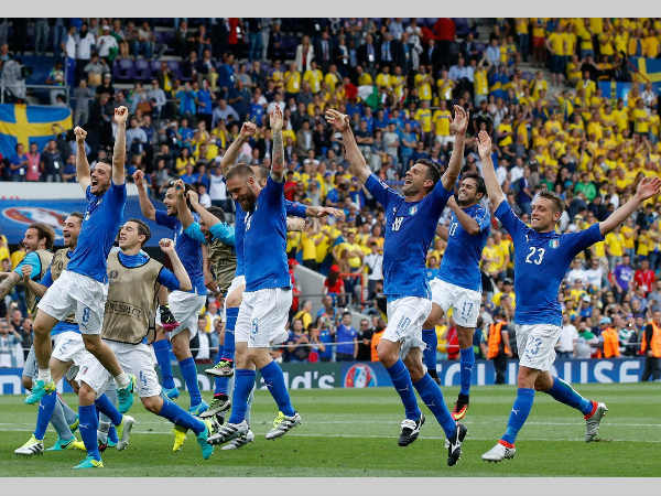 Italian players celebrate at the end of their Euro 2016 match against Sweden Italian players celebrate at the end of their Euro 2016 match against Sweden