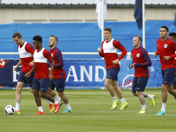 England's players warm up during a training session in Chantilly, France England's players warm up during a training session in Chantilly, France