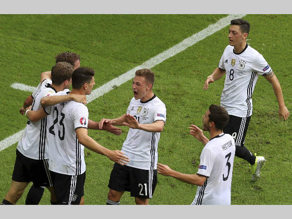 Germany's Mario Gomez, third from left, celebrates with teammates after scoring the opening goal during the Euro 2016 Group C match against Northern Ireland Germany's Mario Gomez, third from left, celebrates with teammates after scoring the opening goal during the Euro 2016 Group C match against Northern Ireland