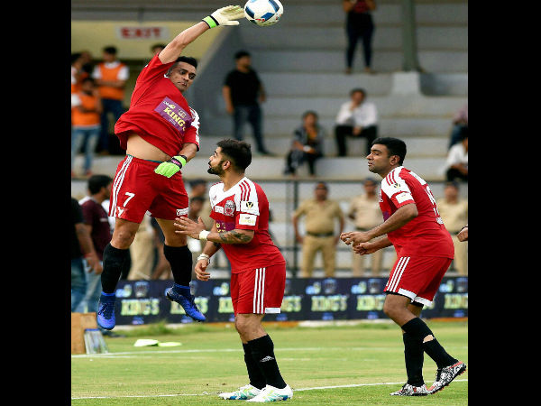 M S Dhoni, Virat Kohli and R Ashwin in action during a charity football match in Mumbai on June 4. M S Dhoni, Virat Kohli and R Ashwin in action during a charity football match in Mumbai on June 4.