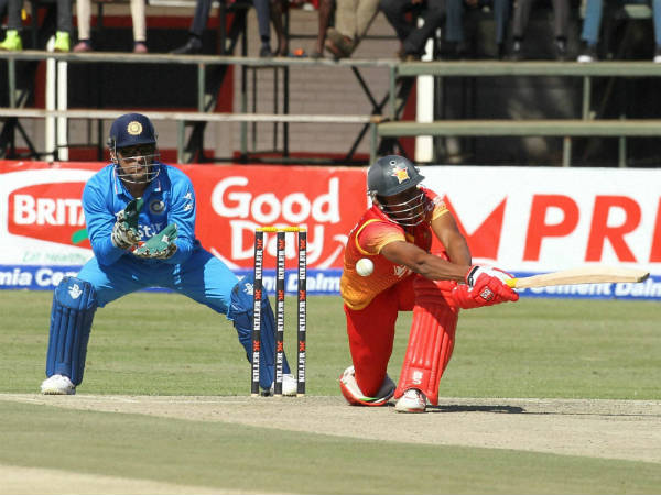 Zimbabwean batsman Vusi Sibanda, right, plays a shot as MS Dhoni watches, during the 2nd ODI in Harare on June 15, 2016 Zimbabwean batsman Vusi Sibanda, right, plays a shot as MS Dhoni watches, during the 2nd ODI in Harare on June 15, 2016