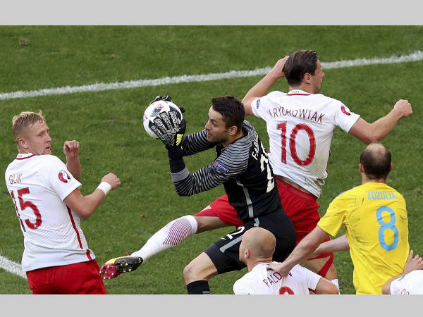 Poland goalkeeper Lukasz Fabianski catches the ball during the Euro 2016 Group C match against Ukraine Poland goalkeeper Lukasz Fabianski catches the ball during the Euro 2016 Group C match against Ukraine