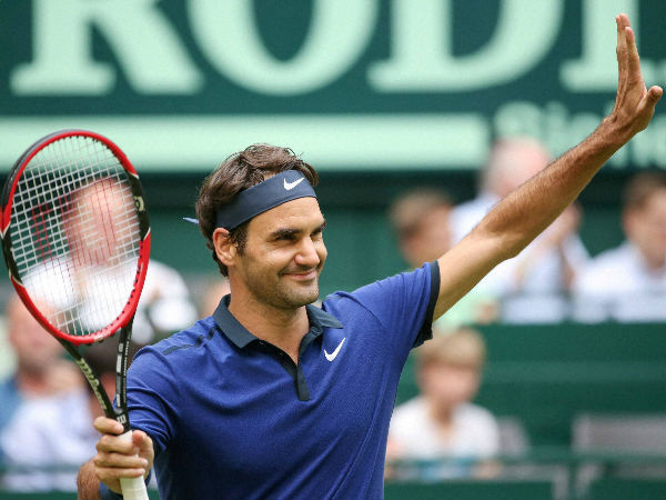 Roger Federer celebrates after winning against Malek Jaziri Roger Federer celebrates after winning against Malek Jaziri