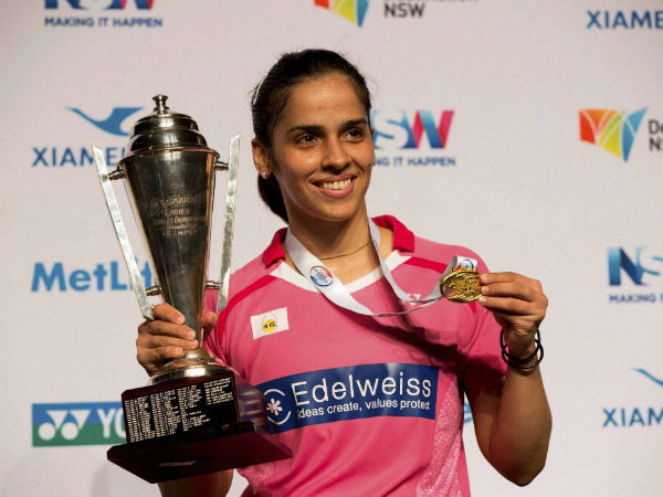 File photo: Saina poses with her Australian Open title this year File photo: Saina poses with her Australian Open title this year
