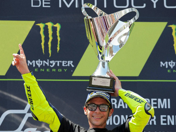 Moto GP rider Valentino Rossi of Italy celebrates on the podium after winning the Catalunya Motorcycle Grand Prix at the Barcelona Catalunya racetrack in Montmelo, just outside Barcelona, Spain, Sunday, June 5, 2016. Moto GP rider Valentino Rossi of Italy celebrates on the podium after winning the Catalunya Motorcycle Grand Prix at the Barcelona Catalunya racetrack in Montmelo, just outside Barcelona, Spain, Sunday, June 5, 2016.