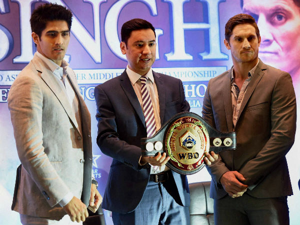 Neerav Tomar (C) of IOS Boxing Promotions with Indian boxer Vijender Singh and Australian boxer Kerry Hope (right) at a press conference in New Delhi on Monday to announce their WBO Asia Pacific Super Middleweight Championship fight to be held in Delhi on 16 July. Neerav Tomar (C) of IOS Boxing Promotions with Indian boxer Vijender Singh and Australian boxer Kerry Hope (right) at a press conference in New Delhi on Monday to announce their WBO Asia Pacific Super Middleweight Championship fight to be held in Delhi on 16 July.