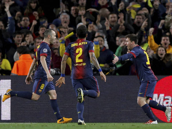 File photo: Barcelona's midfielder Andres Iniesta, left, defender Daniel Alves, from Brazil, centre, and forward Lionel Messi, from Argentina, celebrate Messi's second goal during the Champions League File photo: Barcelona's midfielder Andres Iniesta, left, defender Daniel Alves, from Brazil, centre, and forward Lionel Messi, from Argentina, celebrate Messi's second goal during the Champions League