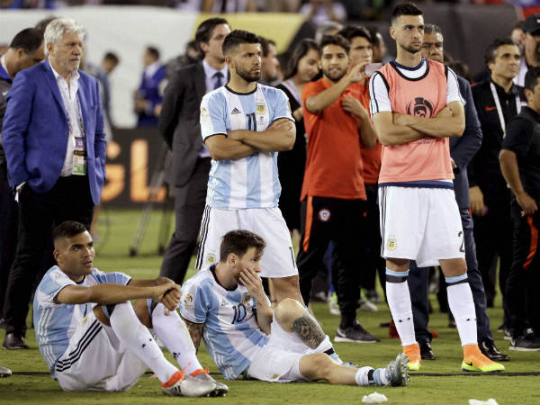 Argentina's Lionel Messi (10) waits with his teammates for trophy presentations after the Copa America final Argentina's Lionel Messi (10) waits with his teammates for trophy presentations after the Copa America final