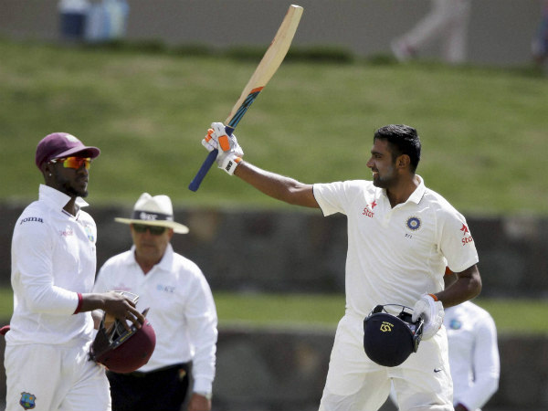 R Ashwin (right) celebrates his Test ton R Ashwin (right) celebrates his Test ton