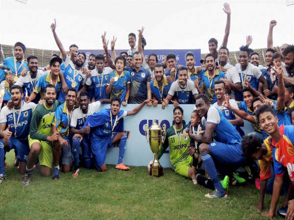 Dempo SC players celebrate with the I-League trophy after their win in the finals of the tournament in Goa Dempo SC players celebrate with the I-League trophy after their win in the finals of the tournament in Goa