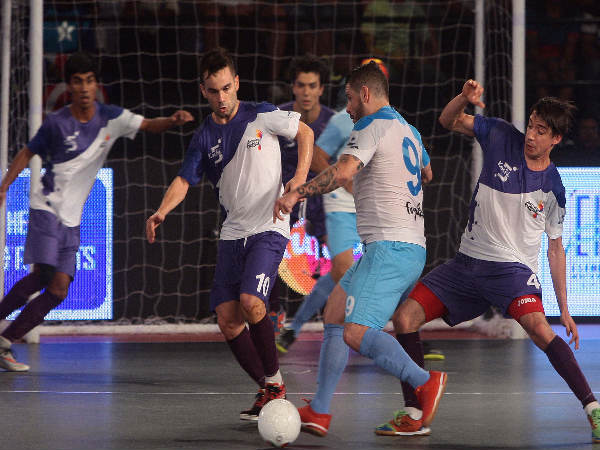 Mumbai 5s Foglia (blue) in action against Kochi 5s Mumbai 5s Foglia (blue) in action against Kochi 5s