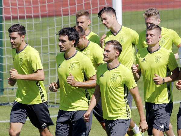 Players run during the last training session of the German national football team at their base camp in Evian-Les-Bains Players run during the last training session of the German national football team at their base camp in Evian-Les-Bains