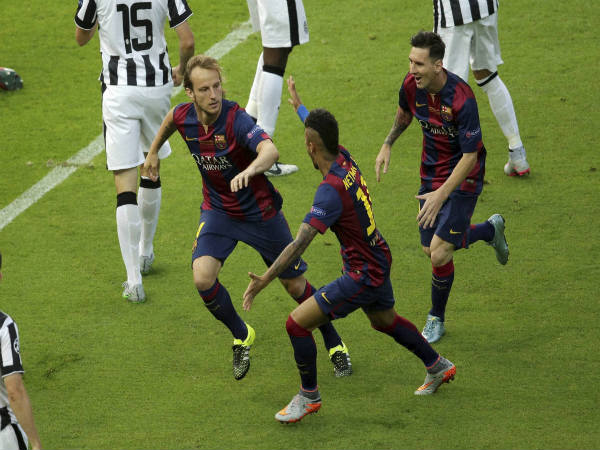 Ivan Rakitic (left) celebrates scoring the opening goal during the Champions League final against Juventus in 2015 Ivan Rakitic (left) celebrates scoring the opening goal during the Champions League final against Juventus in 2015