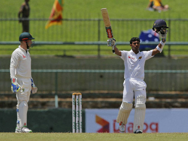 Kusal Mendis celebrates scoring his maiden century, as Australian wicketkeeper Peter Nevill watches on day three of the first test cricket match between Sri Lanka and Australia in Pallekele, Sri Lanka, on July 28, 2016. Kusal Mendis celebrates scoring his maiden century, as Australian wicketkeeper Peter Nevill watches on day three of the first test cricket match between Sri Lanka and Australia in Pallekele, Sri Lanka, on July 28, 2016.
