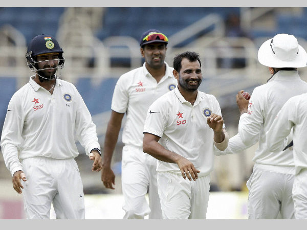 Shami (third from left) celebrates with team-mates after dismissing Rajendra Chandrika (not pictured) during the 1st day of the 2nd Test Shami (third from left) celebrates with team-mates after dismissing Rajendra Chandrika (not pictured) during the 1st day of the 2nd Test