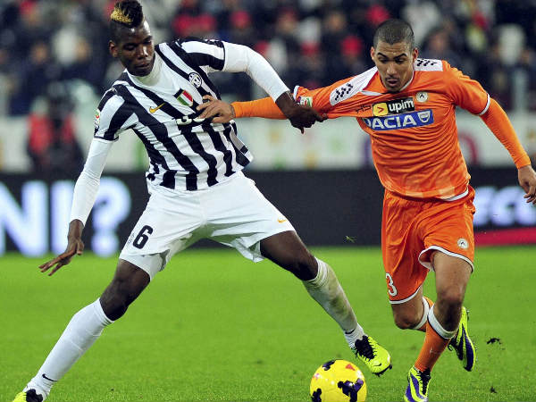 Paul Pogba (left) fights for the ball during a Serie A match Paul Pogba (left) fights for the ball during a Serie A match