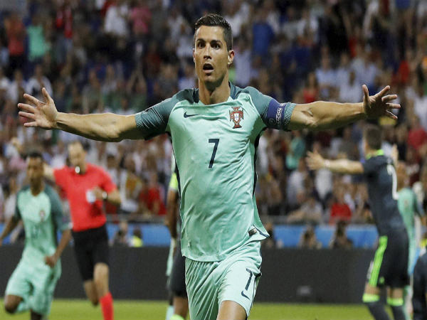 Portugal's Cristiano Ronaldo celebrates after scoring his side's first goal during the Euro 2016 semifinal soccer match between Portugal and Wales Portugal's Cristiano Ronaldo celebrates after scoring his side's first goal during the Euro 2016 semifinal soccer match between Portugal and Wales