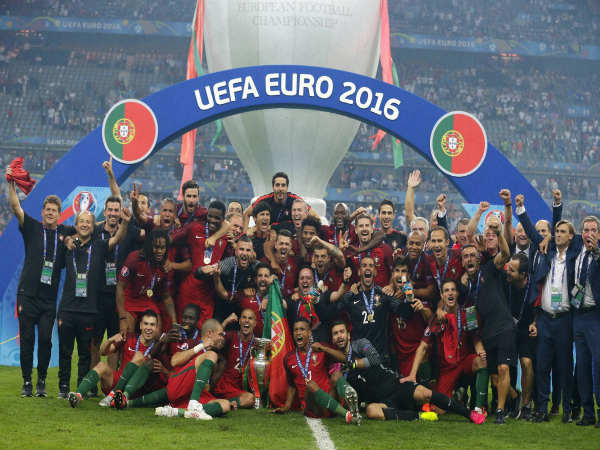 Portugal's team celebrates with the trophy after winning the Euro 2016 final Portugal's team celebrates with the trophy after winning the Euro 2016 final
