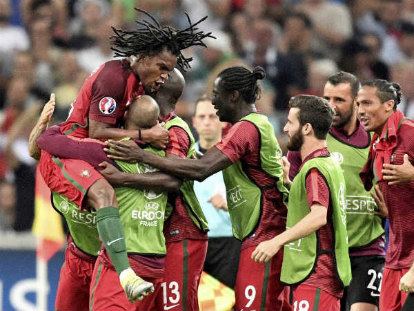 Portugal players celebrate after beating Poland in the quarter-final Portugal players celebrate after beating Poland in the quarter-final