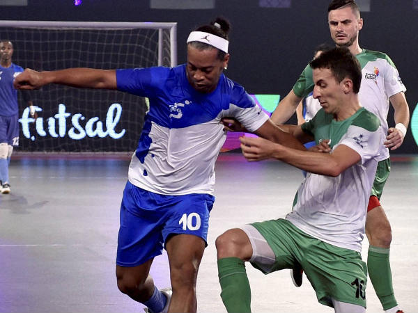 Ronaldhino (left) in action against Bengaluru5s (Green) during the Premier Futsal Football League Ronaldhino (left) in action against Bengaluru5s (Green) during the Premier Futsal Football League