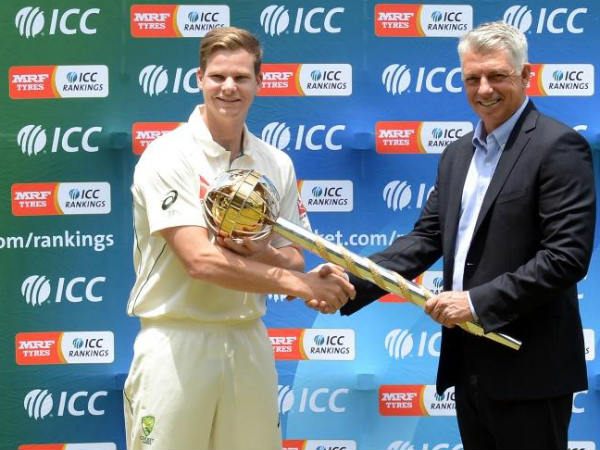 Smith (left) receives the Test mace from Richardson Smith (left) receives the Test mace from Richardson