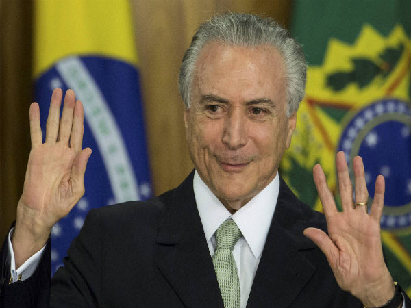 Brazil's acting President Michel Temer arrives to speak in Planalto presidential palace in Brasilia, Brazil Brazil's acting President Michel Temer arrives to speak in Planalto presidential palace in Brasilia, Brazil