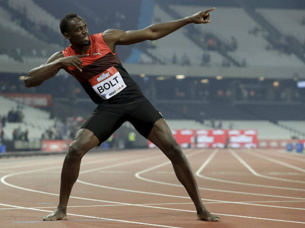 Usain Bolt poses for photographers after he won the men's 200m race during the Diamond League anniversary games Usain Bolt poses for photographers after he won the men's 200m race during the Diamond League anniversary games
