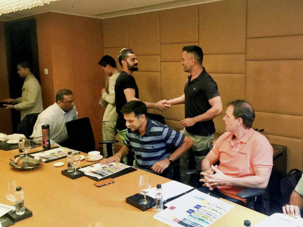 Virat Kohli and MS Dhoni greet each other at a meeting to discuss roadmap for Indian cricket Virat Kohli and MS Dhoni greet each other at a meeting to discuss roadmap for Indian cricket