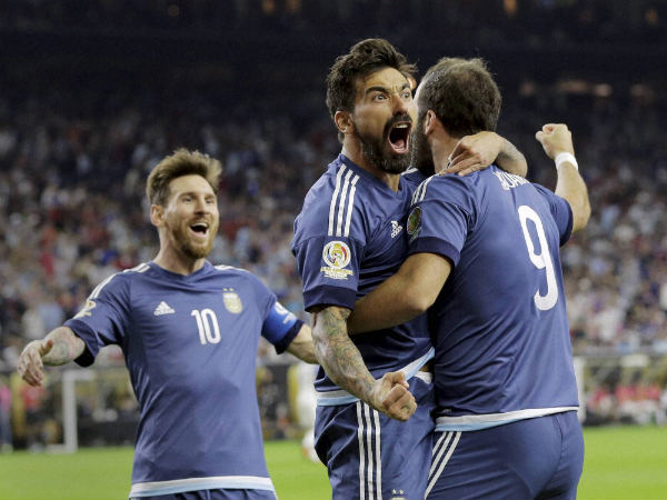 Argetina players celebrating after scoring a goal Argetina players celebrating after scoring a goal