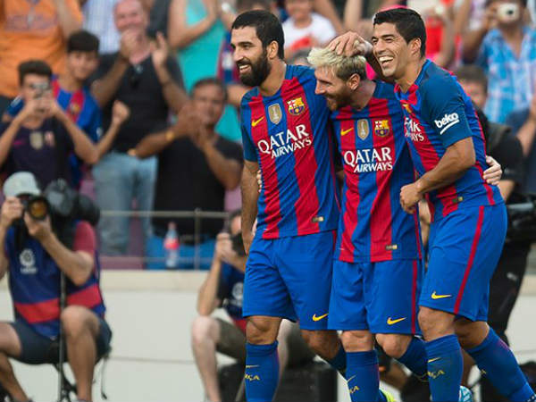 From left: Arda Turan, Lionel Messi and Luis Suarez celebrates after scoring against Real Betis (Image courtesy: FC Barcelona Twitter handle) From left: Arda Turan, Lionel Messi and Luis Suarez celebrates after scoring against Real Betis (Image courtesy: FC Barcelona Twitter handle)