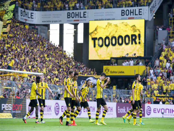 Borussia Dortmund players celebrate after scoring against Mainz (Image courtesy: Dortmund Twitter handle) Borussia Dortmund players celebrate after scoring against Mainz (Image courtesy: Dortmund Twitter handle)