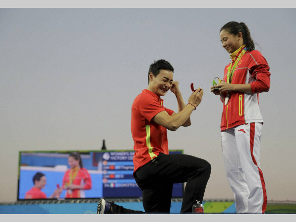 Qin Kai (left) celebrates as his proposal is accepted by girlfriend He Zi at Rio Olympics Qin Kai (left) celebrates as his proposal is accepted by girlfriend He Zi at Rio Olympics