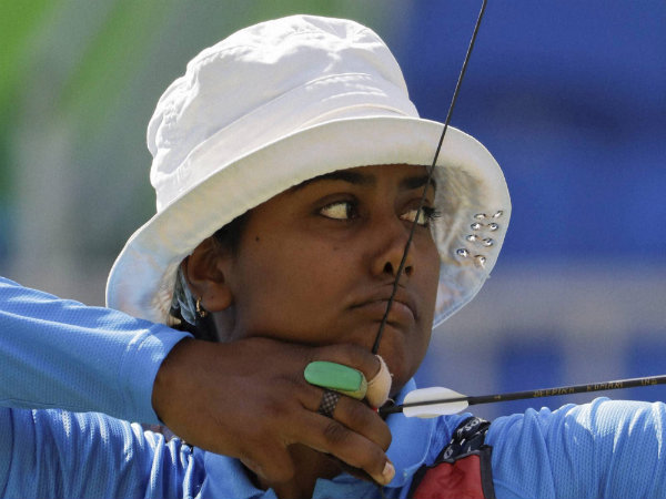 India's Deepika Kumari aims for the target during the women's team archery competition India's Deepika Kumari aims for the target during the women's team archery competition