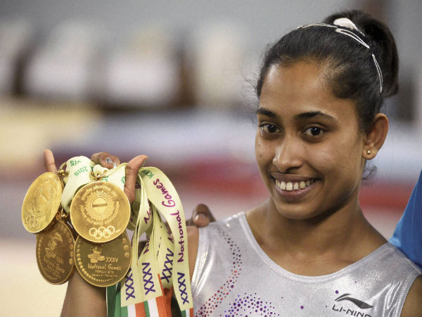 Dipa Karmakar flaunting her five gold medals which she won at the 35th National Games Dipa Karmakar flaunting her five gold medals which she won at the 35th National Games