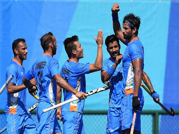 Indian hockey players celebrate after scoringa goal against Ireland Indian hockey players celebrate after scoringa goal against Ireland
